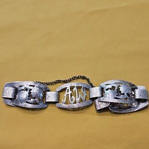 Vintage sterling silver link bracelet with openwork or pierced floral design